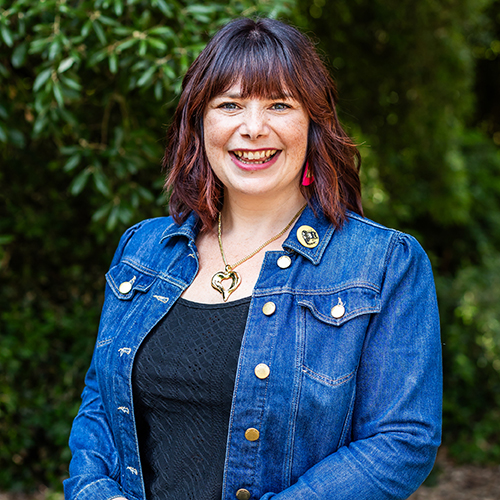 Katie Bell in blue denim jacket.